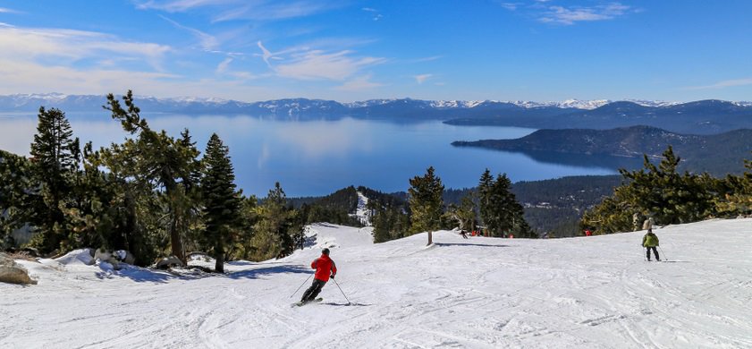 Downhill skiing above Lake Tahoe