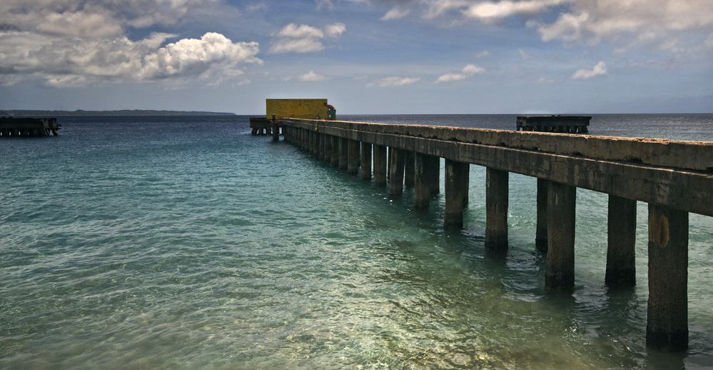 Pier,At,Crashboat,Beach,In,Puerto,Rico.,Dynamic,Clouds,And