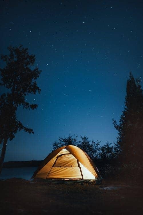 Tent camping under the starry night